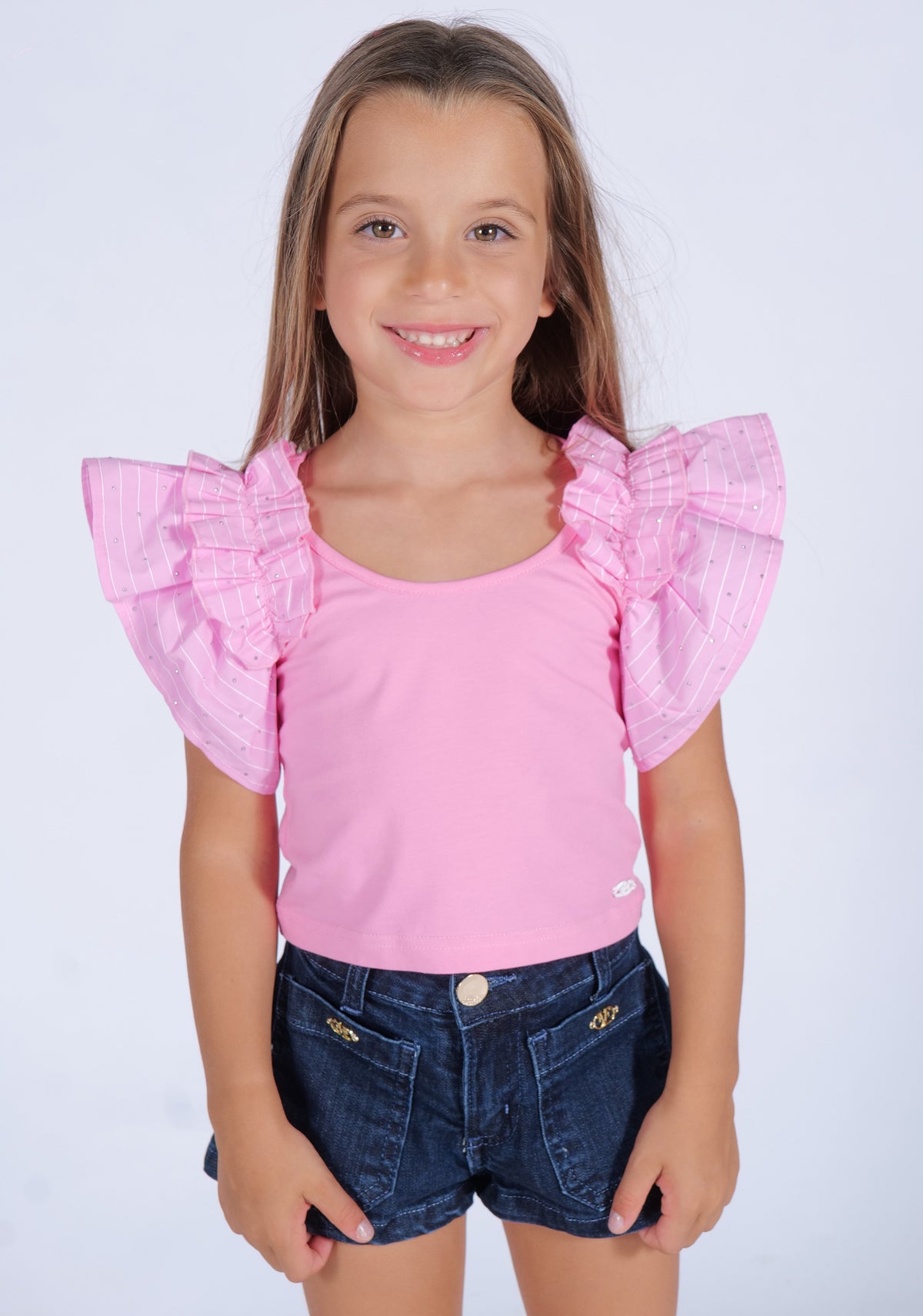 TOP IN TESSUTO ELASTICO CON VOLANT