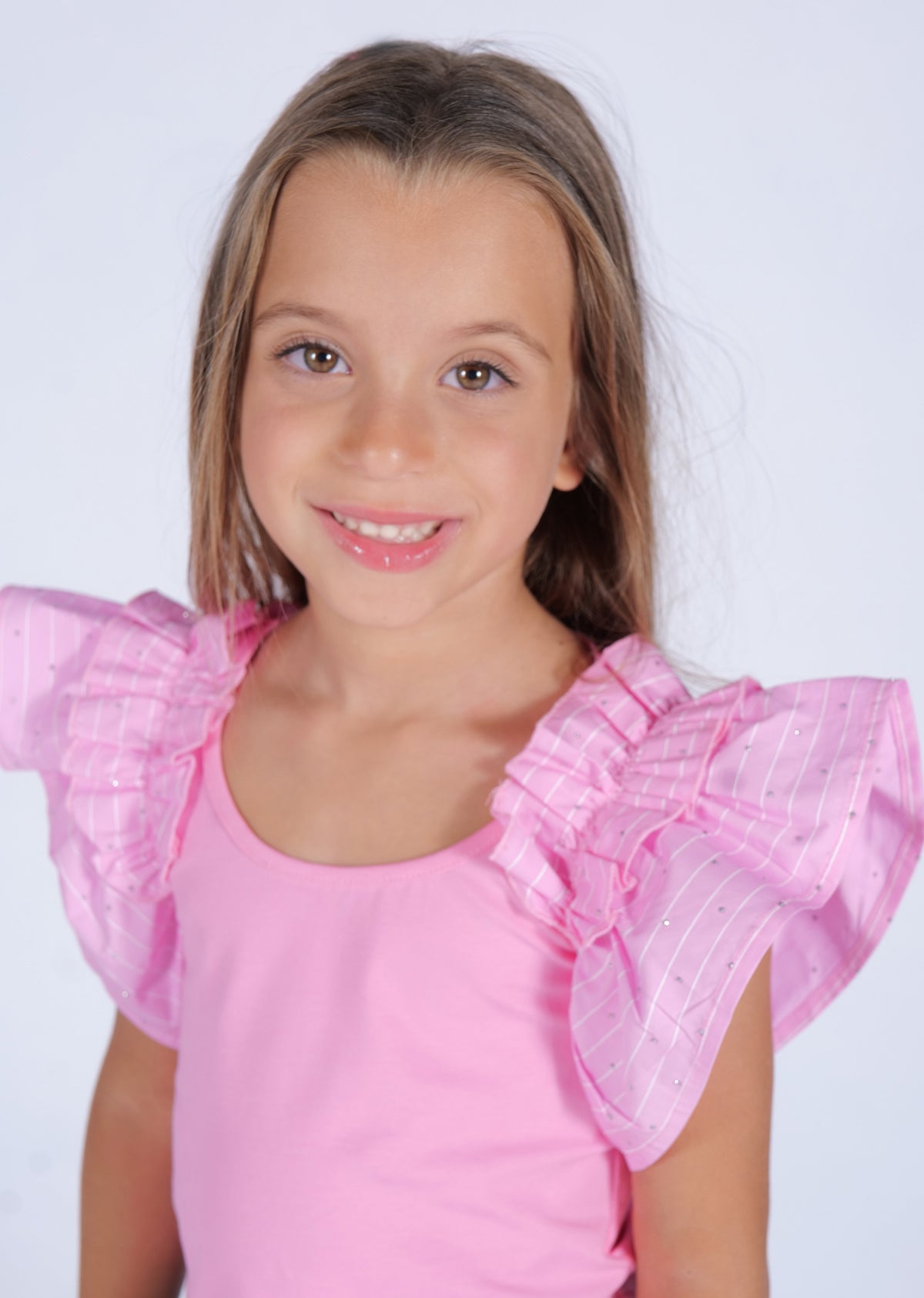 TOP IN TESSUTO ELASTICO CON VOLANT